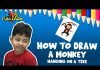 Draw a monkey hanging from a tree
